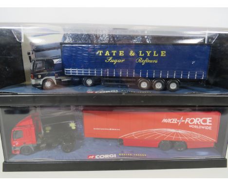 Two Corgi 1:50 Scale Die Cast models from the Modern Trucks Collection. Both with original perspex boxes.  Ex Display conditi