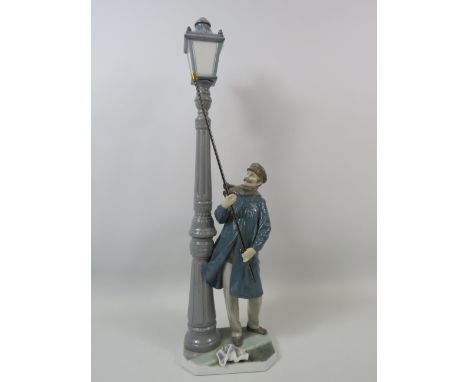 Lladro Figurine Lamp lighter, approx 19" tall and come with its box.