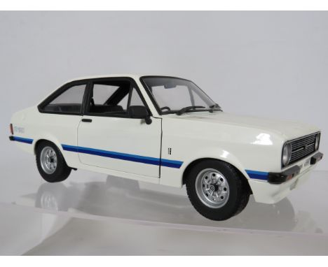 Minichamps 1:18 Scale Limited edition (1-600) Die cast model of a 1975 Ford Escort Mk11 RS 1800 Original box and packaging.  