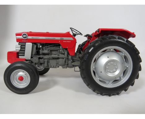 Die Cast Universal Hobbies 1:16 Scale Massey Ferguson Tractor. Ex display condition. See photos. 