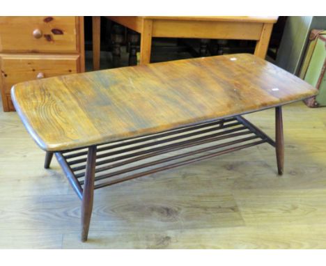 Mid 20th Century Dark wood Ercol Style low coffee table with mag rack under. H:14 x W:41 x D:18 Inches. Good for re-furb.   S