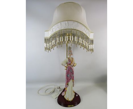 Vittorio Sabadin Italian figurine lamp with shade. 35" from base to the top of the shade.