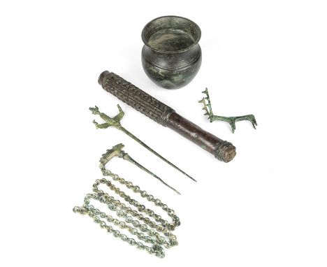 An ancient Lustrian bronze mace head, 25cm; a Western Asiatic bronze pin with chain; a bronze deer; a vessel; and a furthur p