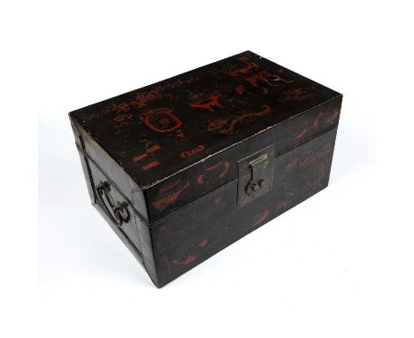 A 19th century Eastern lacquered box with iron ring handles and red lacquered decoration, 41cm wide x 26cm deep x 22cm highSo