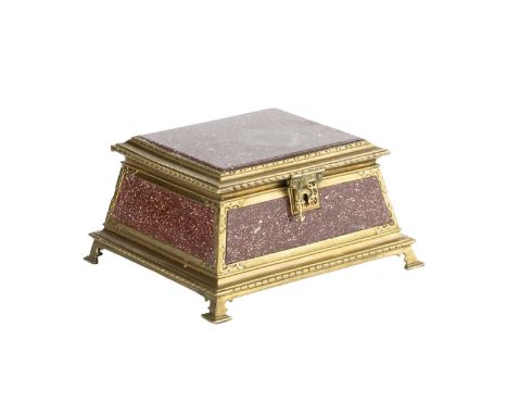 A 19th century French porphyry and gilt metal jewellery casket of rectangular tapering form with a fabric lining and stepped 