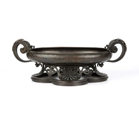 An antique bronze trophy of neoclassical design monogrammed MCC possibly Melbourne Cricket Club, 47cm wide x 26cm deep x 16cm