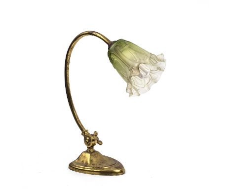 An early 20th century adjustable desk lamp with an opaque green glass shade, 14cm wide x 42cm high