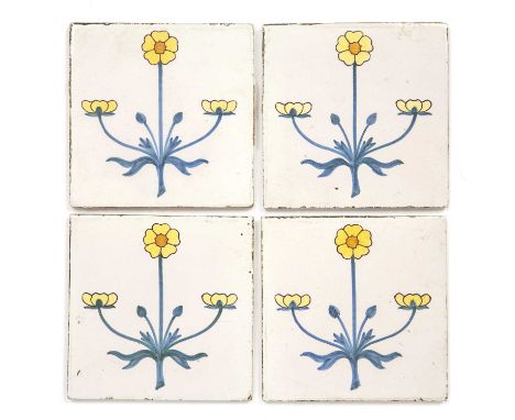 A set of four Delft tiles each with flower designs, in the William Morris style, 13cm squareIn good condition, with some ligh