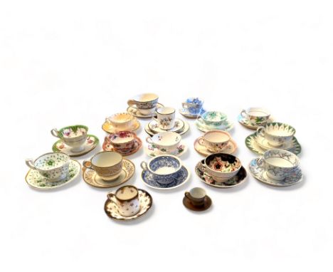 A collection of eighteen largely mid 19th century English porcelain cups and saucers
Including two trios and comprising examp