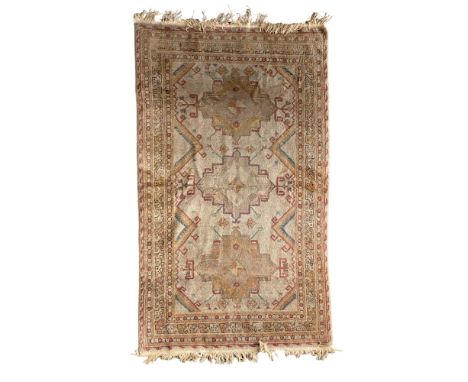 A vintage&nbsp;Ushak design rug
203cm x 116cm

