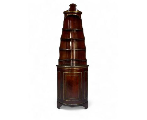 A 19th century French Louis Phillipe mahogany and applied brass bowfront corner cupboard&nbsp;
With tiered superstructure abo