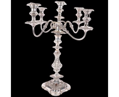 An early 20th century silver plated 5-light table candelabrum, with foliate acanthus baluster stem, removeable sconces, and c