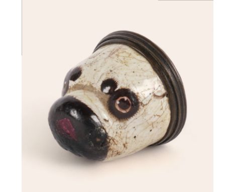 A Staffordshire enamel novelty Pug dog head, "Trifles Shew Respect" patch box, circa 1770