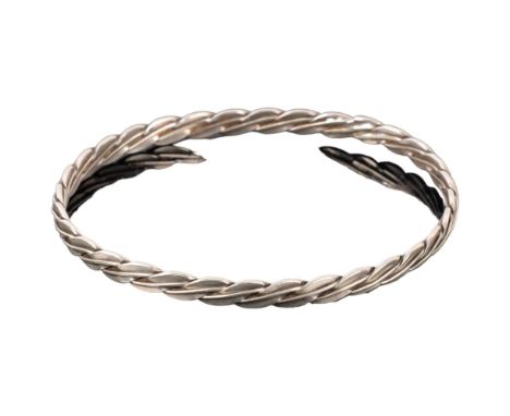 An Elizabeth II silver slave bangle, indistinct maker, London 1986, internal circumference approx 21cm, 17.6g 
