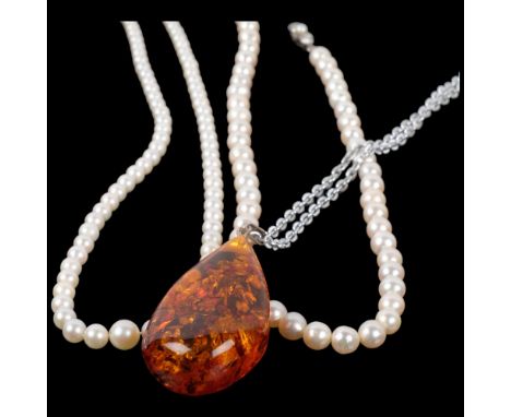 2 single-strand pearl bead necklaces with silver clasps, and an amber pendant necklace (3) 