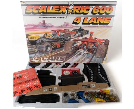 SCALEXTRIC - a Scalextric 600 electric model racing lane kit, appears complete and with original box, all vehicles and contro