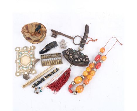 A collection of interesting items, including a 19th century lacquered French snuffbox in the shape of a shoe, 8cm, a small Ti