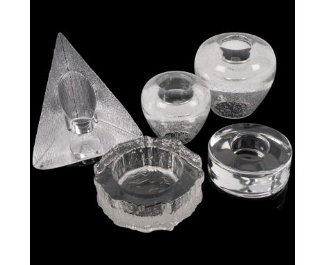 A group of glass candle holders, including a triangular crystal-cut candle holder, by Nybro of Sweden, H17cm, a second signed