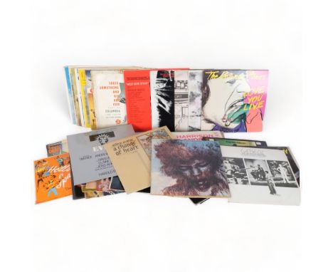 A quantity of vinyl LPs and 7" singles, including The Rolling Stones "Love You Live", The Rolling Stones "Sticky Fingers", Ji