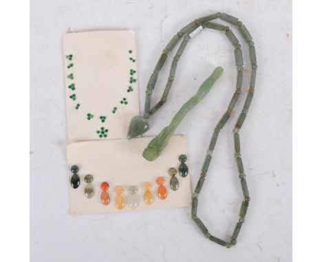 A jade necklace, with heart-shaped pendant, L80cm, and a jade carved dragon pipe, and a selection of jade adornments attached