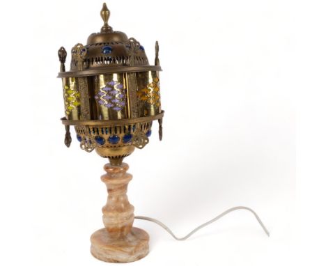 A lovely Moroccan table lamp, with an onyx base, and decorative copper carousel shade, with multiple toned light filters, H44