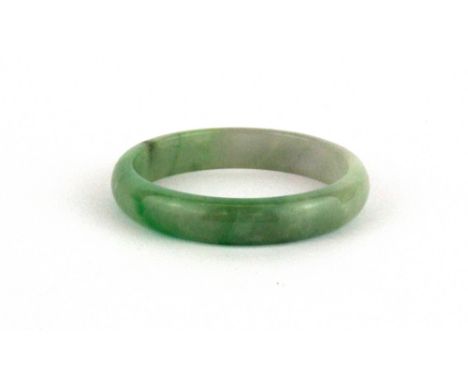 A fine Chinese polished jade bangle, internal Dia. 5.8cm W. 1.2cm.