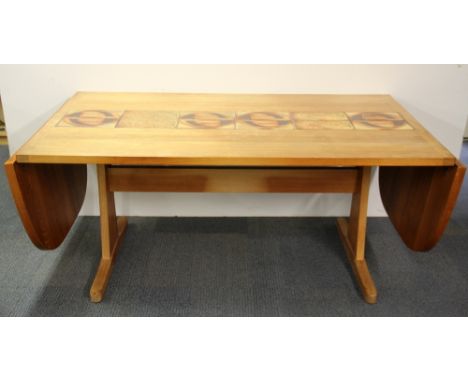 A 1970's heavy quality Scandinavian teak dining table inset with ceramic tiles, extends from 162 - 262cm W.90cm.