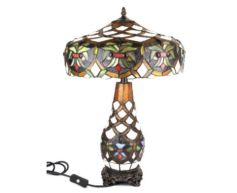 A superb Tiffany style table lamp with illuminated body, H. 58cm.