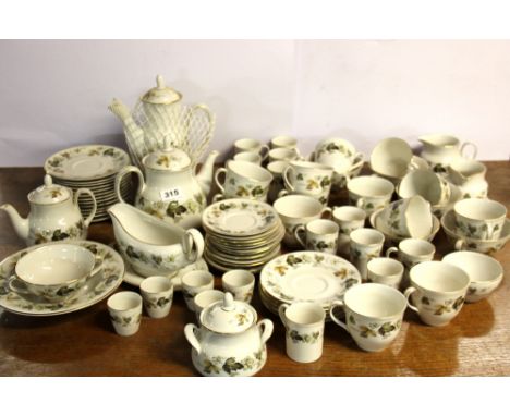 A very extensive Royal Doulton Larchmont tea and coffee service, coffee pot lid repaired.