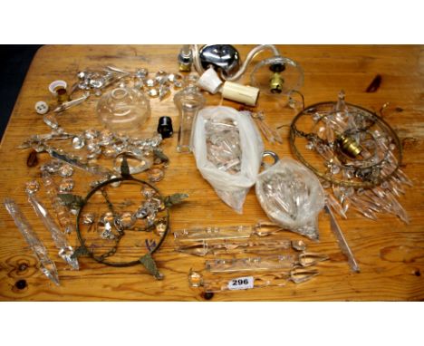 Two crystal chandelier drop light fittings currently dismantled.