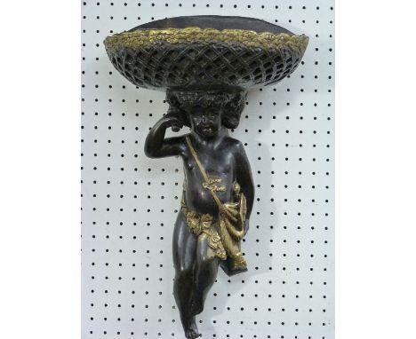 A decorative classical-style bronze Wall Vase, in the form of Bacchus carrying a basket on his head, after Jean Baptiste Carp