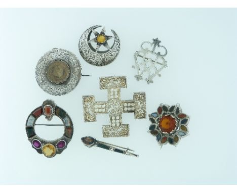 A collection of silver Scottish Jewellery; two brooches set with citrines and coloured agates, one set with a citrine, one wi