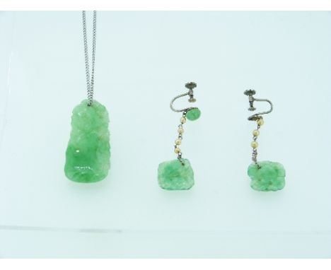 A jade Pendant and pair of Earrings, the oblong pendant pierced and engraved with fruit and flowers, 1¾in 4.5cm) long, on a w