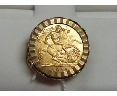 AN Elizabeth II gold Half Sovereign, dated 1982, mounted in a 9ct gold ring.