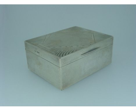 An Art Deco silver Cigarette Box, maker's mark "C.L.S", hallmarked London, 1920, of hinged rectangular form, the lid with geo