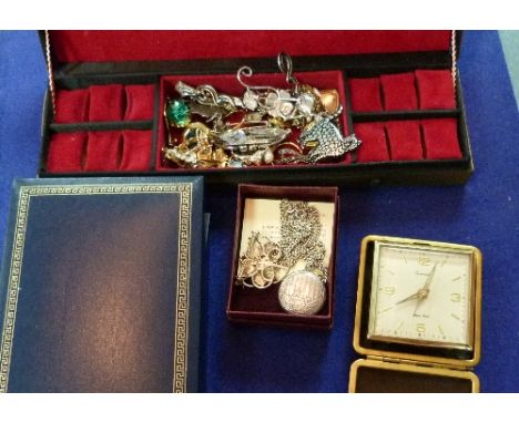 A collection of Jewellery and Costume Jewellery, including a silver locket and chain, a silver 'Tree of Life' brooch, rings, 