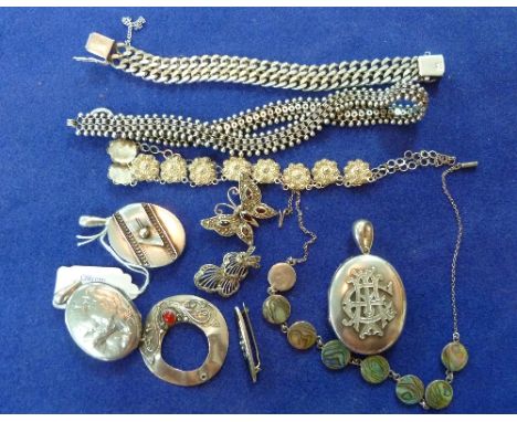 Silver Jewellery; an attractive silver chain of star pierced links with ball finials on each side with an oval silver locket,