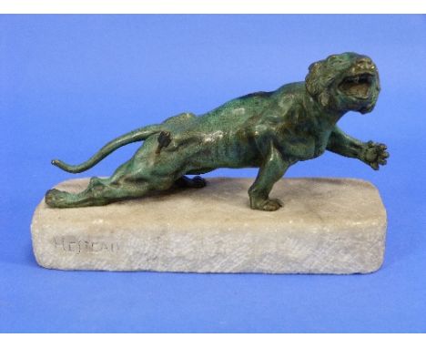 J. Hesteau, a 1920's French green patinated bronze figure of a wounded Tiger, on marble base, the base signed 'Hesteau', 10?i