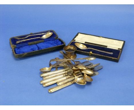 A George V silver Spoon and Fork set, hallmarked Sheffield, 1911, Kings pattern, in presentation case, and a silver christeni