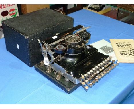 A Varityper vintage typewriter, circa 1920's, in carry case, all in good condition, together with two publications relating t