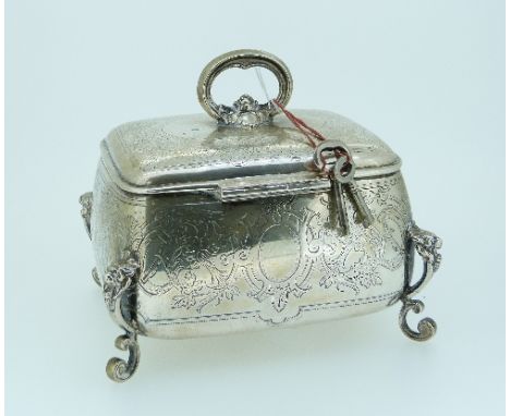 A 19thC continental silver Austro-Hungarian style Tea Caddy, marked "750", of rounded rectangular form with ring handle and l