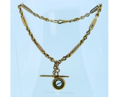 A 9ct yellow gold Watch Chain, formed of large oval double links with three alternate plain and twisted links between, a mini