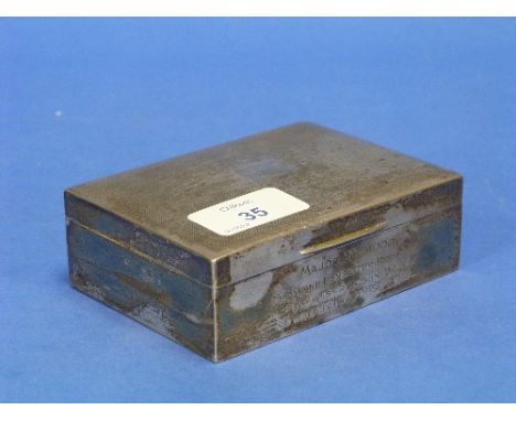 An Elizabeth II silver Cigarette Box, hallmarked Sheffield, 1965, of rectangular form with engine-turned decoration and inscr