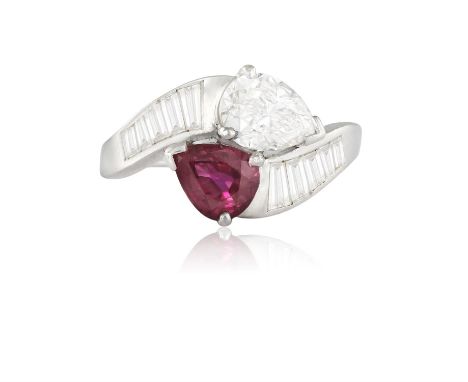 A RUBY AND DIAMOND 'TOI ET MOI' DRESS RING, BY A. E. KÖCHERTOf crossover design, set with a pear-shaped ruby and a pear-shape