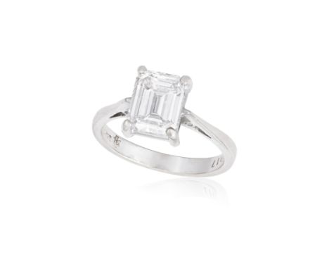 A DIAMOND SINGLE-STONE RINGThe rectangular-cut diamond weighing 2.22cts, within a four-claw setting to a plain hoop, mounted 