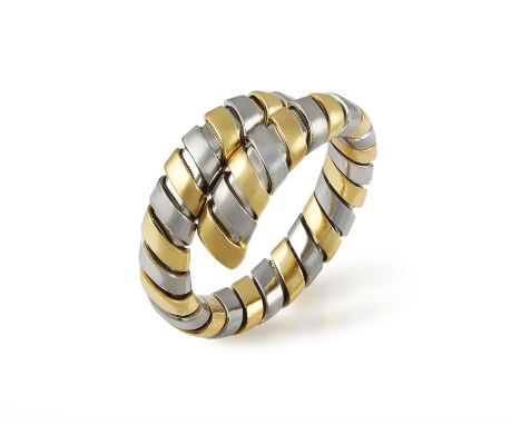 A GOLD AND STEEL TUBOGAS RING, BY BULGARIOf flexible bi-coloured coil design, in 18K gold and steel, signed Bvlgari, Italian 