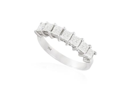 A DIAMOND SEVEN-STONE RINGSet with seven princess-cut diamonds with claw-setting, to a plain hoop, mounted in 14K gold, diamo