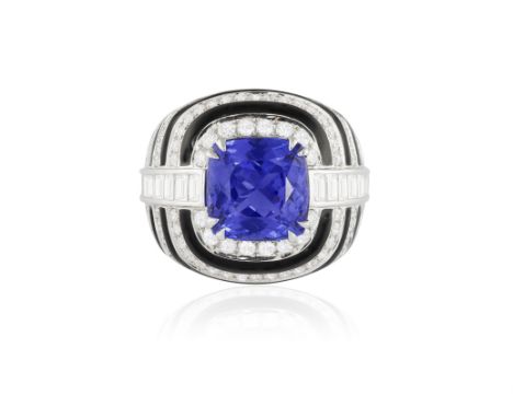 A TANZANITE, ONYX AND DIAMOND COCKTAIL RINGOf bombé design, the central cushion-shaped tanzanite weighing approximately 6.50c