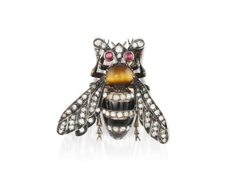 A LATE 19TH CENTURY BUMBLEBEE BROOCH, CIRCA 1880The thorax formed as a cabochon tiger's eye, the abdomen set with rose-cut di