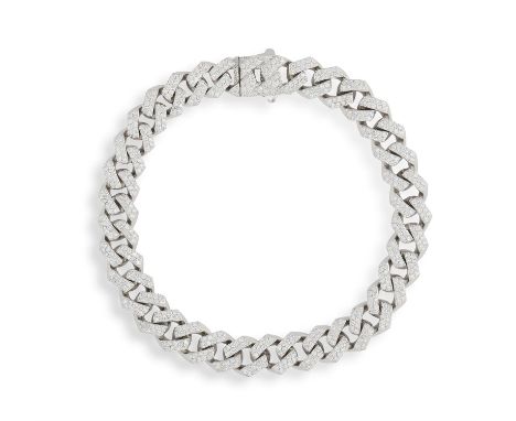 A DIAMOND BRACELETComposed of a flat curb-link chain pavé-set with brilliant-cut diamonds throughout, mounted in 18K gold, di